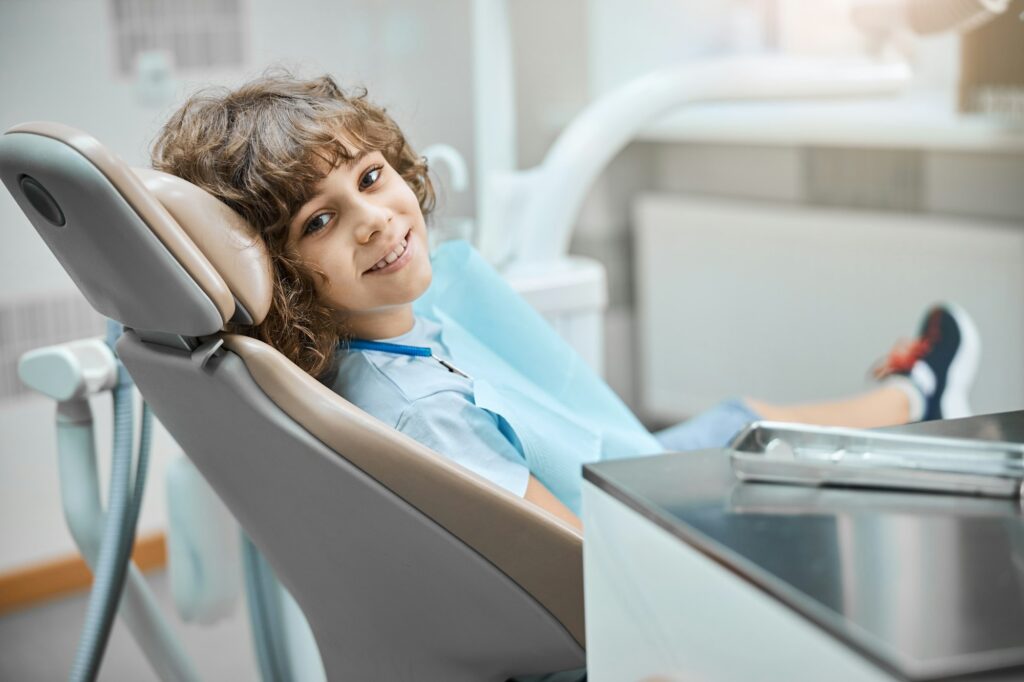curly-child-waiting-for-a-dental-examination-1024x682