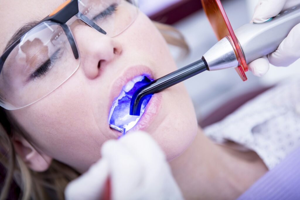 hardening-of-dental-filling-at-the-dentist-1024x682