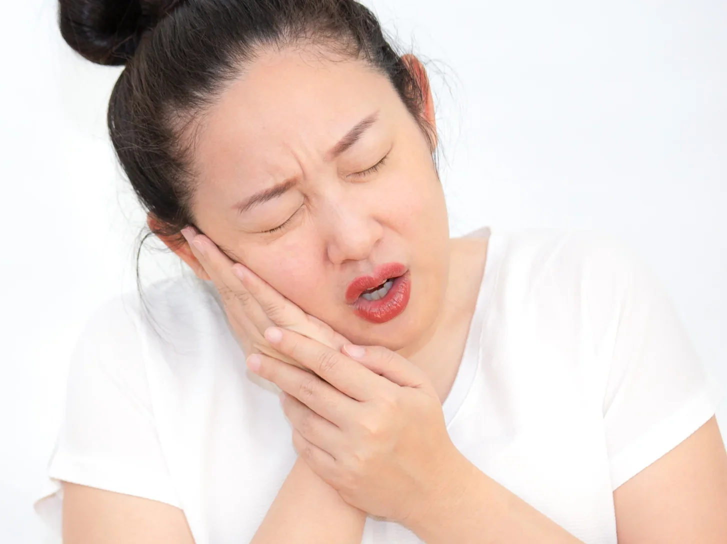 picture-woman-with-toothache-putting-hand-her-cheek-pain-having-dental-health-problems-looking-after-scaled-e1717613885632